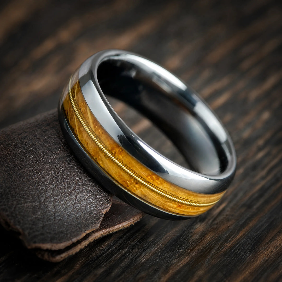 The Anthem Tungsten, Whiskey Barrel Wood and Guitar String ring - angled view