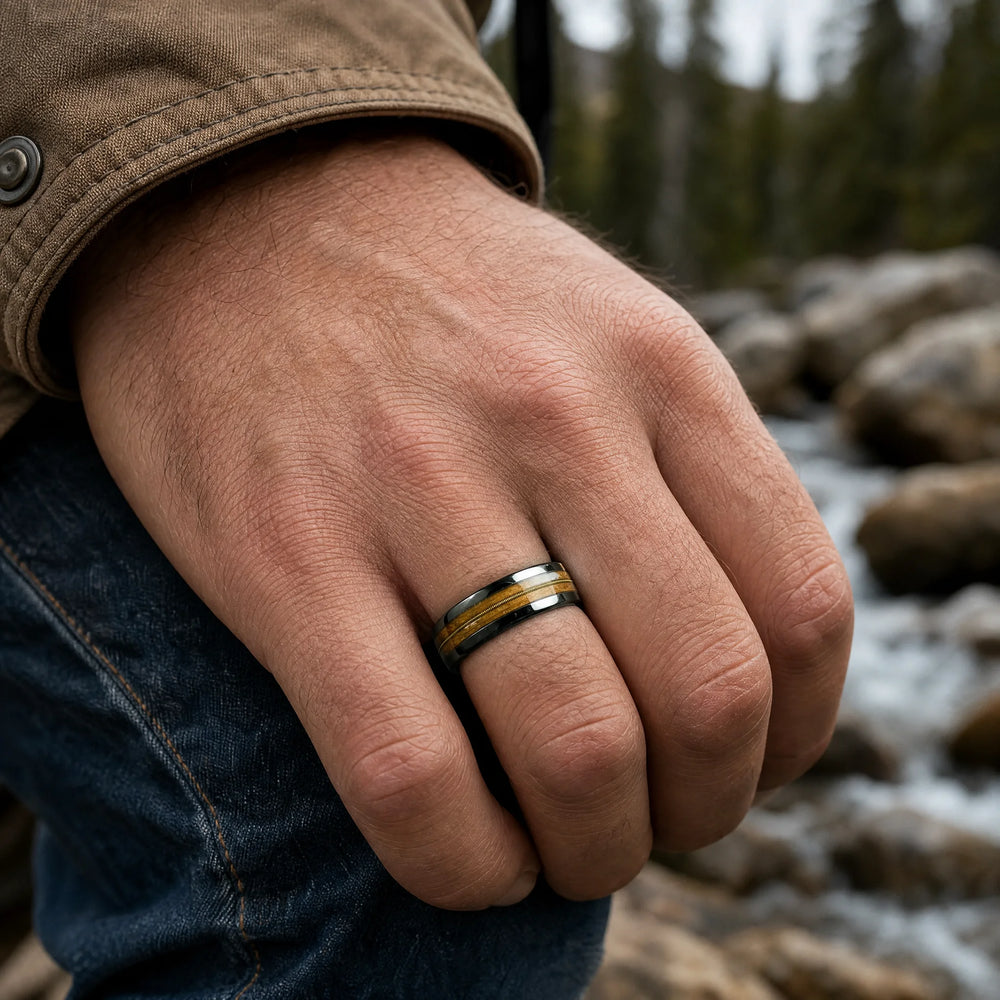 The Anthem Tungsten, Whiskey Barrel Wood and Guitar String ring - on-hand view