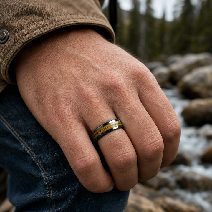 The Anthem Tungsten, Whiskey Barrel Wood and Guitar String ring - on-hand view