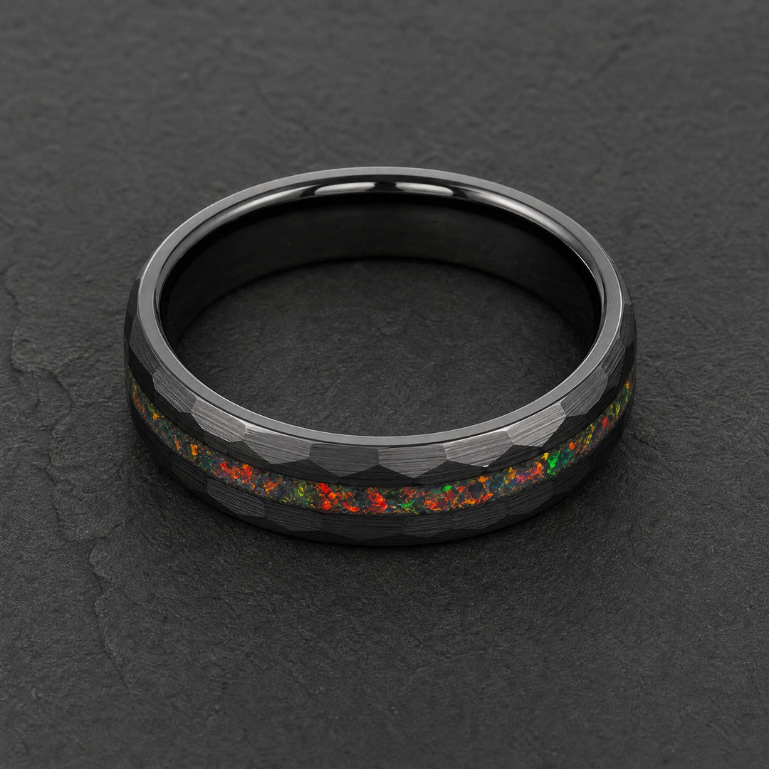 The Caldera hammered tungsten and fire opal ring - angled view