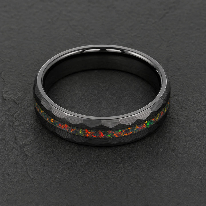 The Caldera hammered tungsten and fire opal ring - angled view