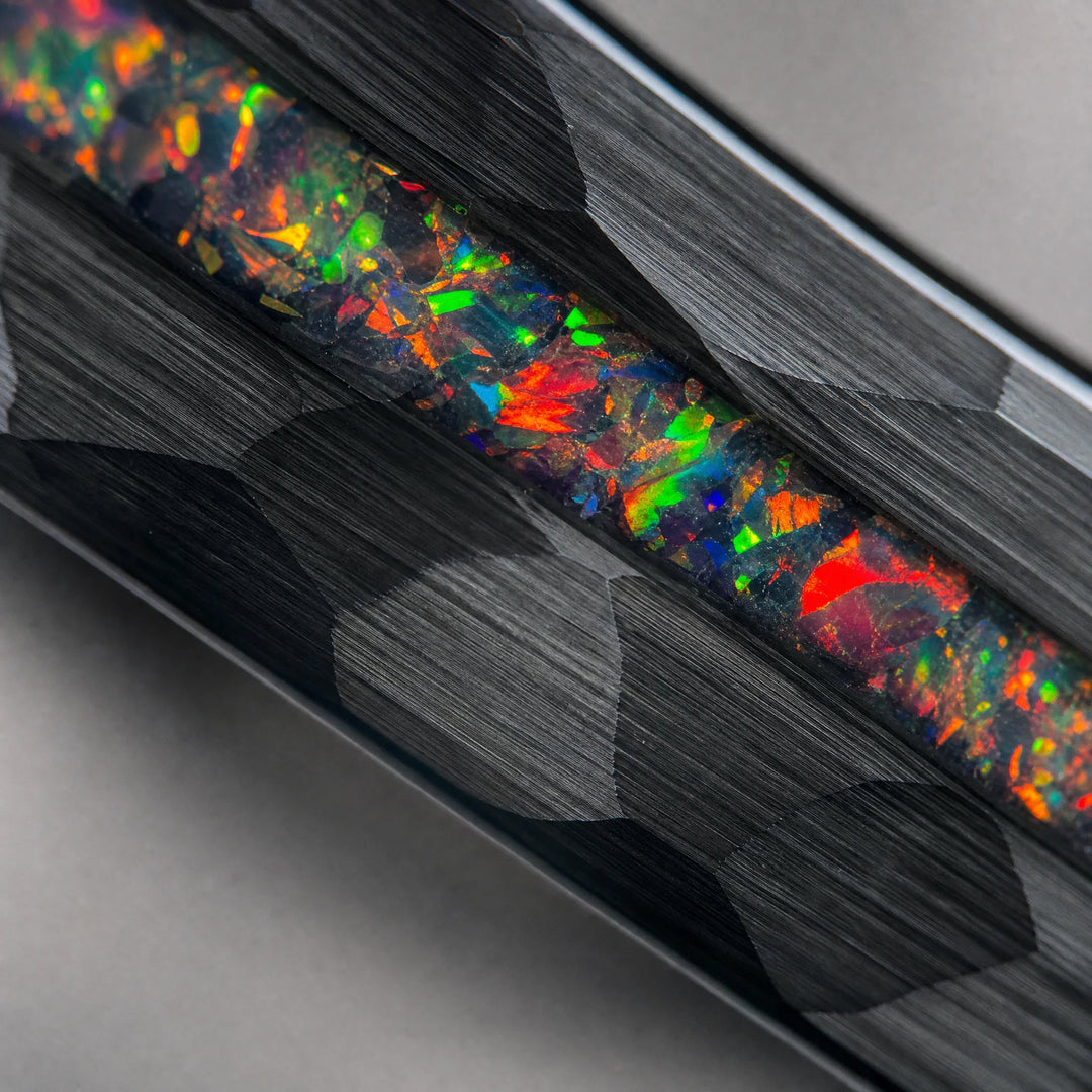 The Caldera hammered tungsten and fire opal ring - detail view