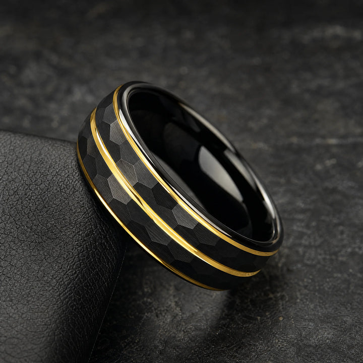 The Citadel Hammered Black Tungsten and Gold ring - angled view