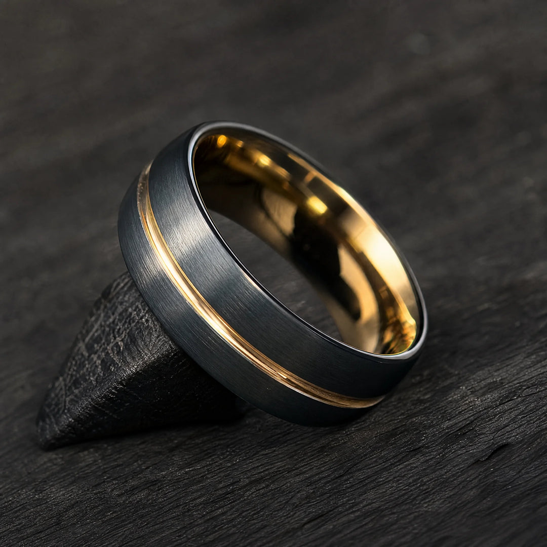 The Datum Black Tungsten &amp; 18K Gold ring - angled view