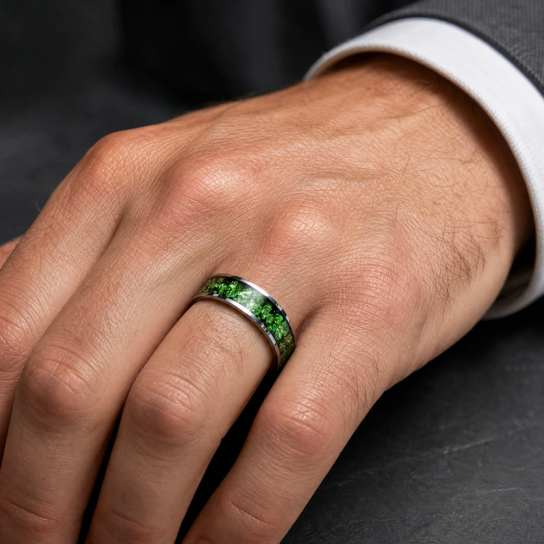 The Isotope Tungsten and Emerald ring - on-hand view