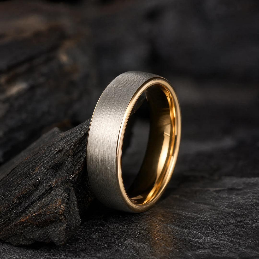 The Mandate Brushed Tungsten and 18K Gold ring - angled view