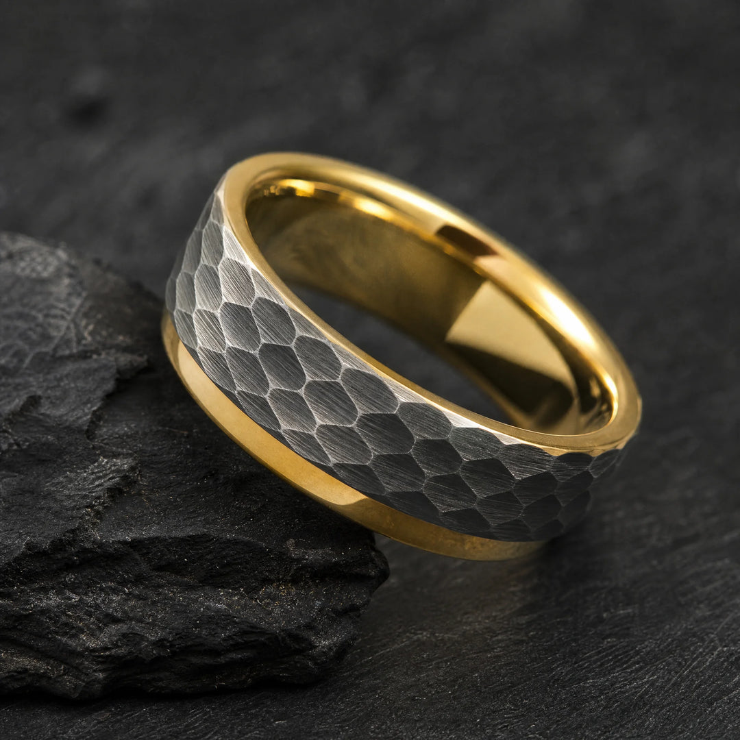 The Myrmidon hammered tungsten and gold ring - angled view