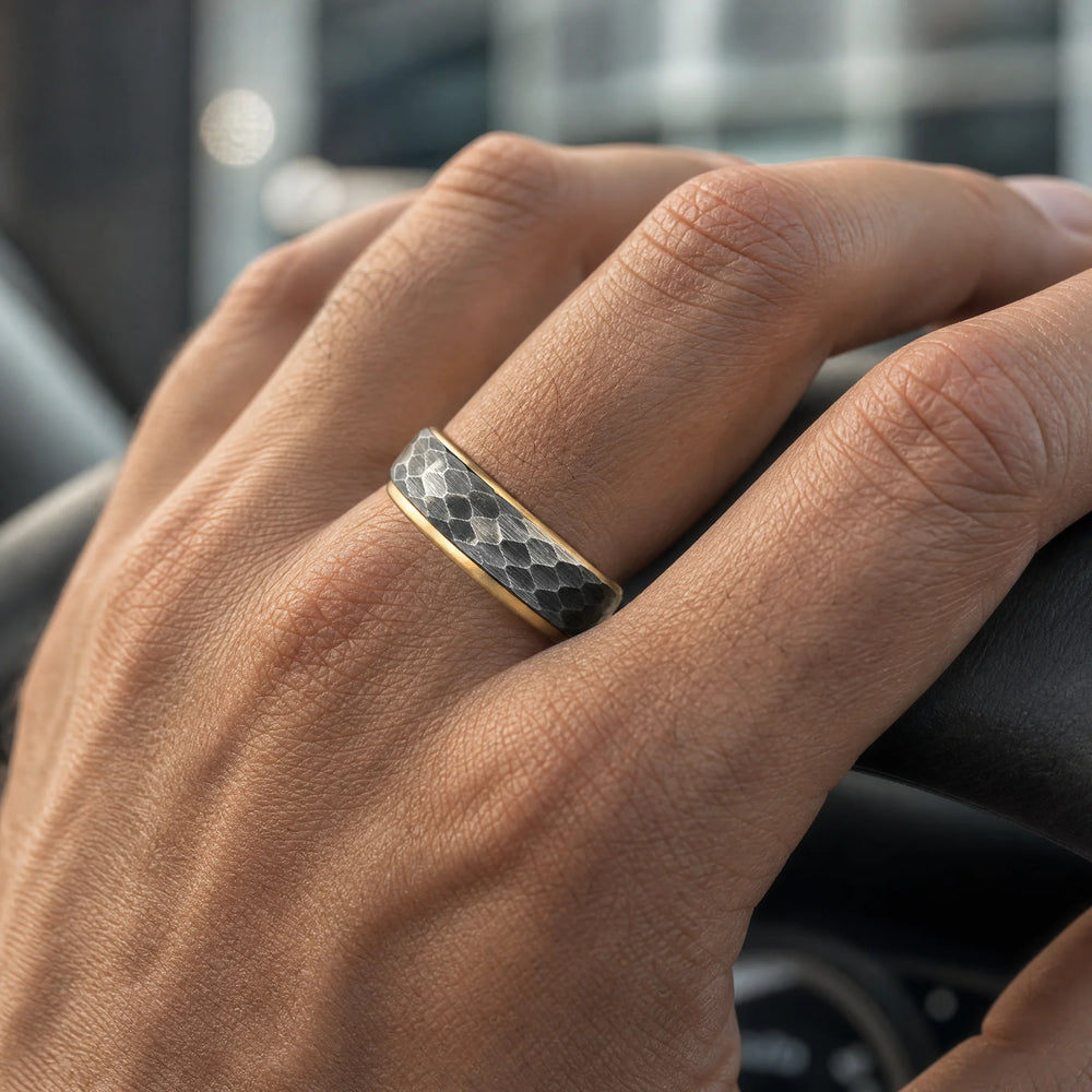 The Myrmidon hammered tungsten and gold ring - on-hand view