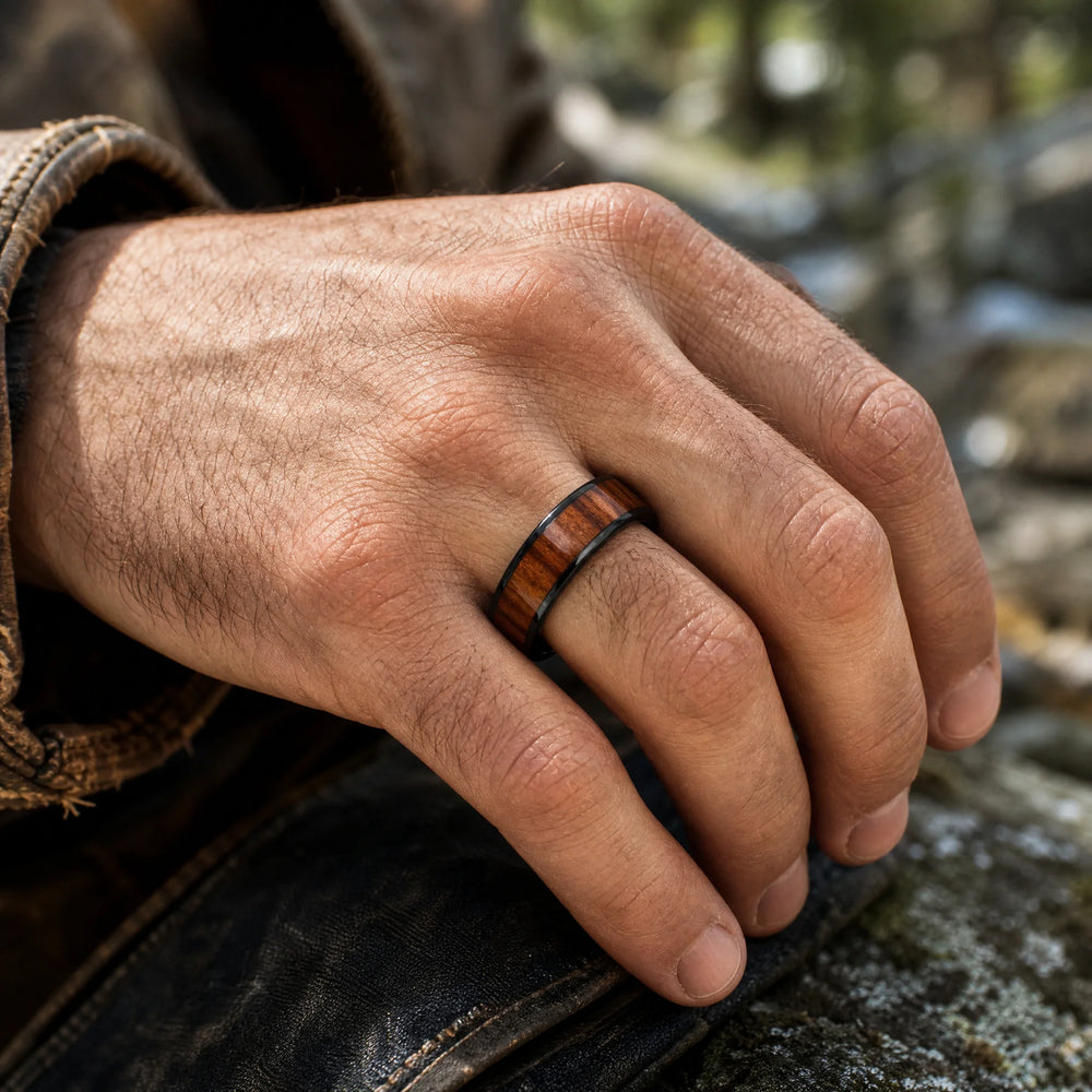 The Palisade black tungsten and wood ring - on-hand view