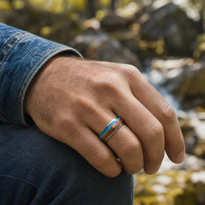 The Sagitta Titanium, Wood, and Turquoise Ring - on-hand view